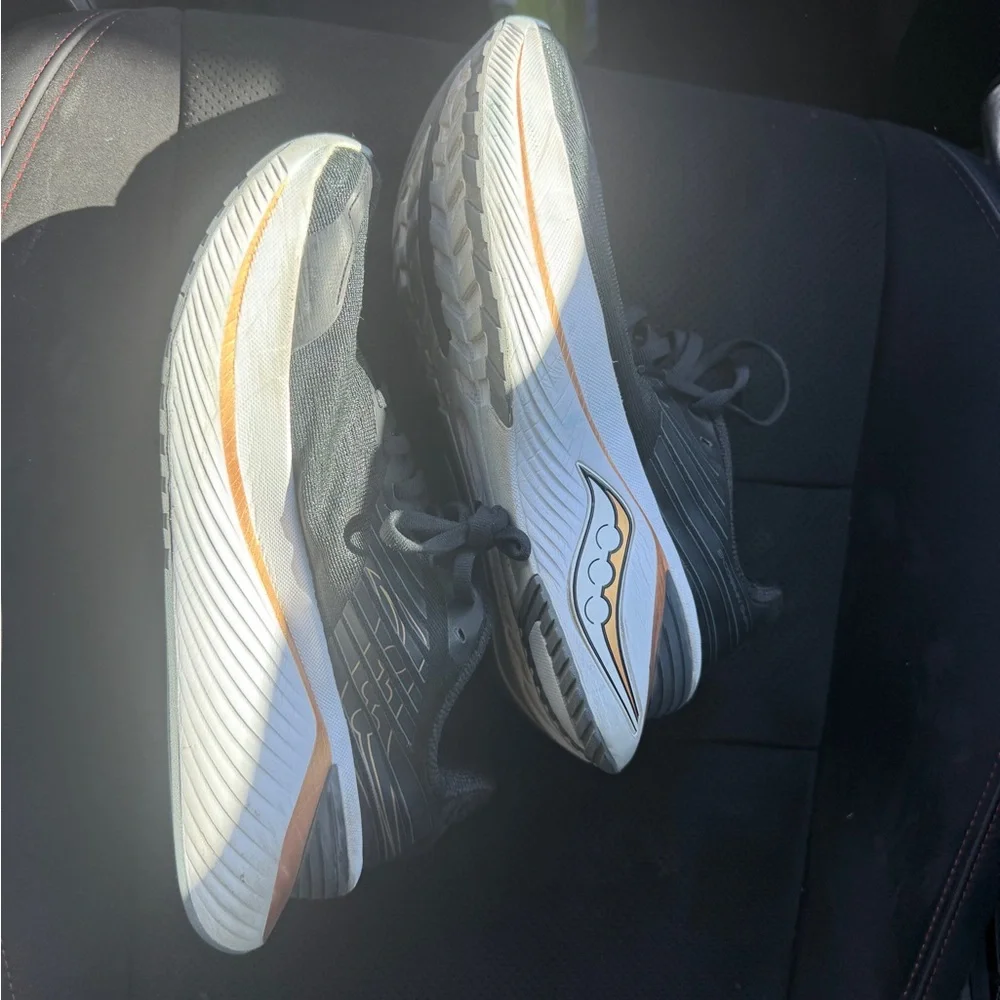 Saucony Black and Gold Athletic Shoes